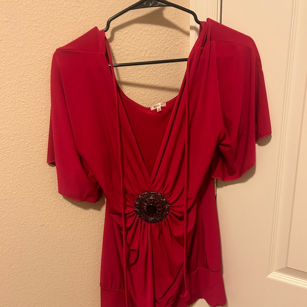Large red studio y top for women. Low cut and ties in front